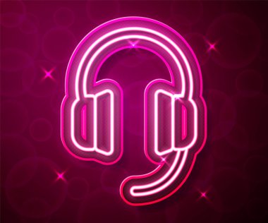 Parlayan neon hattı kulaklık simgesi kırmızı arkaplanda izole edildi. Kulaklıklar. Müzik, hizmet, iletişim ve operatör konsepti. Vektör