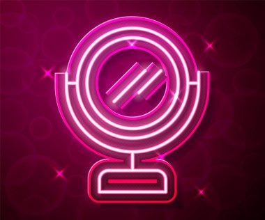 Parlayan neon hattı yuvarlak makyaj aynası ikonu kırmızı arkaplanda izole edildi. Vektör