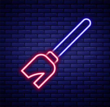 Parlayan neon hattı cadıları süpürge ikonu tuğla duvar arkasında izole edildi. Mutlu Cadılar Bayramı Partisi. Renkli taslak konsepti. Vektör