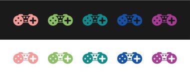Gamepad simgesini siyah ve beyaz arkaplanda izole et. Oyun kontrolörü. Vektör