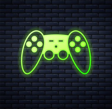 Parlayan neon oyun alanı simgesi tuğla duvar arka planında izole edildi. Oyun kontrolörü. Vektör