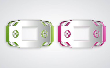 Kağıt kesimi taşınabilir oyun konsolu simgesi gri arkaplanda izole edildi. El bilgisayarı oyun konsolu. Kağıt sanatı tarzı. Vektör