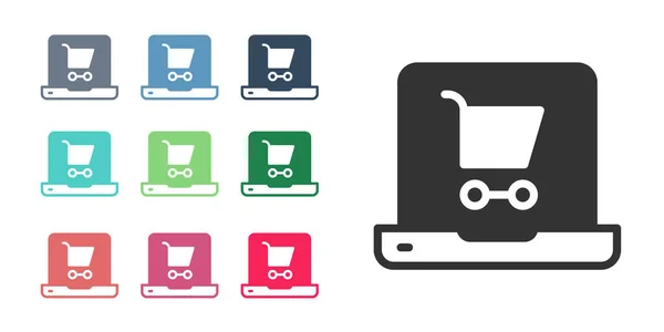 Carrito de compras negro en pantalla icono portátil aislado sobre fondo blanco. Concepto e-commerce, e-business, marketing online. Establecer iconos de colores. Vector — Vector de stock