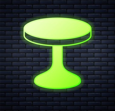 Parlayan neon yuvarlak masa simgesi tuğla duvar arkasında izole edilmiş. Vektör