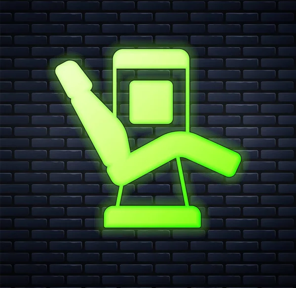 Glowing Neon Medical Dental Chair Icon Isolated Brick Wall Background — Stockový vektor