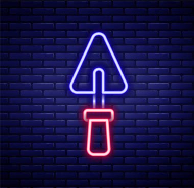 Parlayan neon hattı Trowel simgesi tuğla duvar arka planında izole edildi. Renkli taslak konsepti. Vektör