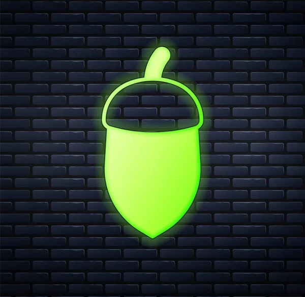 Parlayan neon meşe palamudu simgesi tuğla duvar arkasında izole edilmiş. Vektör.