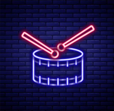 Parlak neon çizgili davul çubuğu simgesi tuğla duvar arkasında izole edilmiş. Müzik işareti. Müzik aleti sembolü. Renkli taslak konsepti. Vektör.