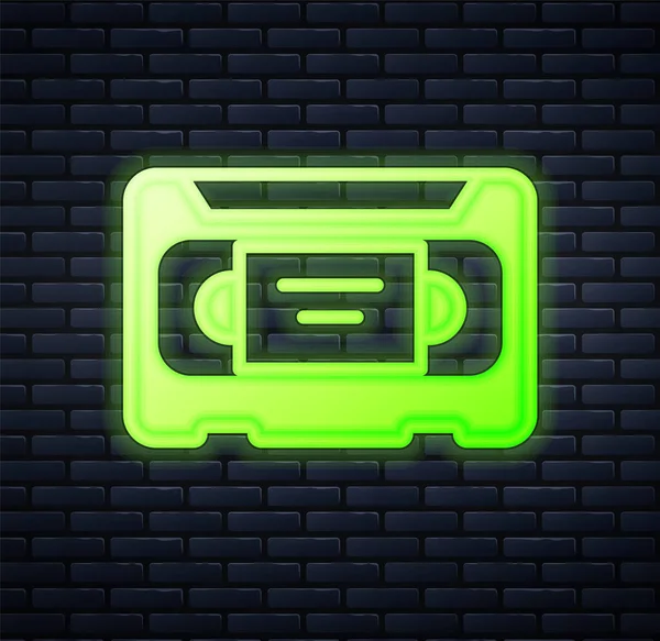Zářící Neon Vhs Video Kazeta Ikona Izolované Cihlové Zdi Pozadí — Stockový vektor