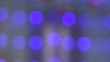 Soyut çember. Soyut bokeh arkaplanı yanıp sönüyor.