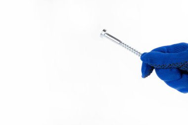 El hareketi. Kendi kendine dokunan vida. İnşaat eldiveni kendi kendine dokunan bir vida tutar.