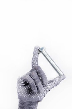 İnşaat malzemeleri. Beyaz arka planda büyük bir cıvata var. Beyaz arkaplanda sürgü