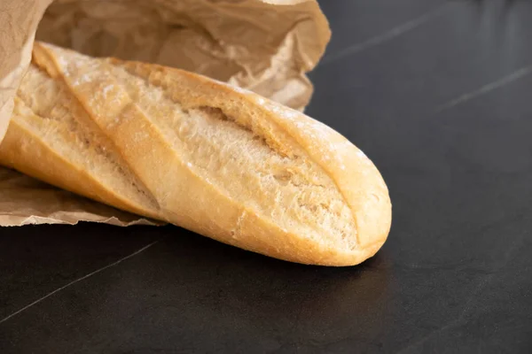 White Loaf Paper Black Background — Stok fotoğraf