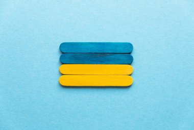 Ukrainian flag in the center on a blue background