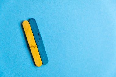 broken flag of ukraine on a blue background