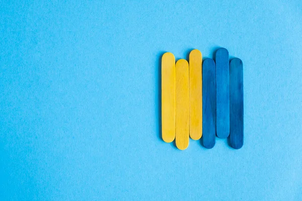 Ukraine flag on a blue background, free space. Place for text.