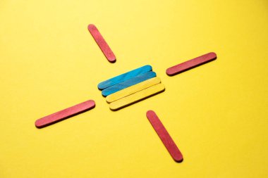 Flag of ukraine under the gun of red sticks. War in Ukraine. Attack. 