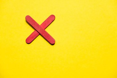 red cross on yellow background free space