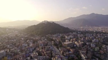 Flying over Kathmandu towards Swayambhunath Stupa in Nepal.