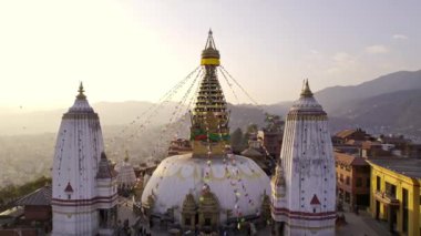 Flying backwards viewing Swayambhunath Stupa in Kathmandu Nepal.