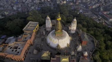 Revealing the city of Kathmandu in Nepal looking past Swayambhunath Stupa.