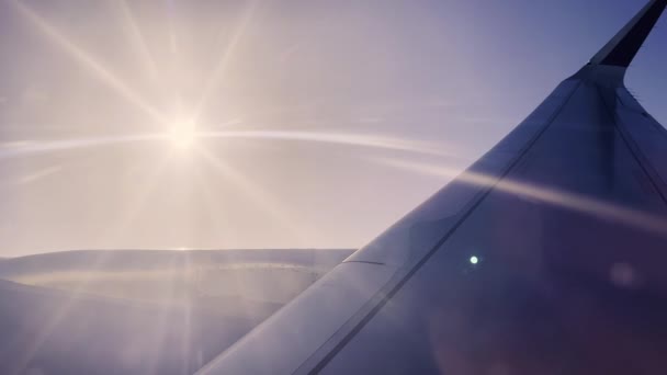 Looking Out Window Airplane While Turning Sun Passes Wing — 图库视频影像