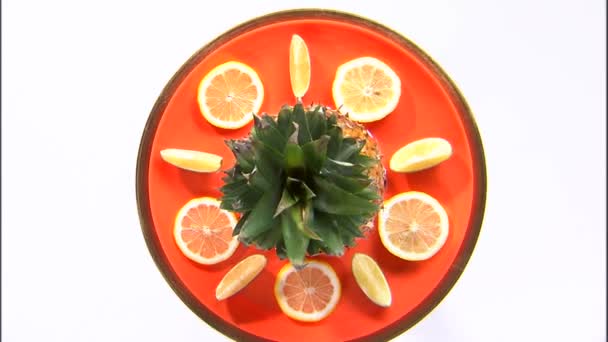 Medium Shot Plate Fruit Rotating White Screen — Stock Video