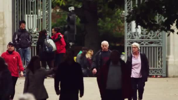 London Circa October 2011 Stationary Shot People Walking Close Gates — Stock Video