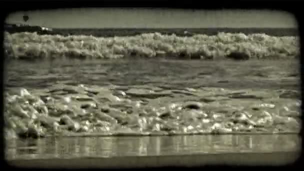 Small Waves Crash Crawl Beach Covering Sparkling Sand Each Drawn — Stock Video