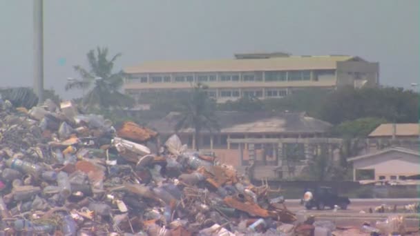 Wide Shot City Building Trash Foreground Africa — Stock Video