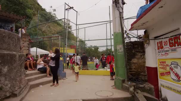 Rio Janeiro Brazil June 2013 Slow Dolly Shot Favela Occupants — Stock Video
