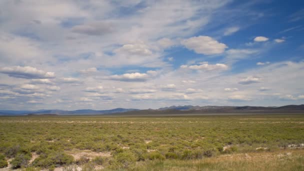 Wide Time Lapse Grassy Plain Clouds Landscape — Stock Video