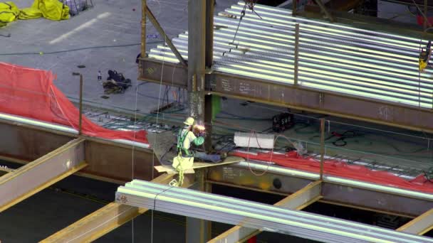 Wide Shot Man Welding Construction Site Downtown Salt Lake City — Stock Video