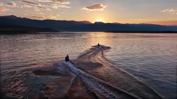 People Riding Personal Watercraft Aerial View Sunset Hebgen Lake Montana — Video Stock