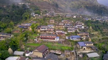 Aerial view flying over village in Nepal near Pokhara.
