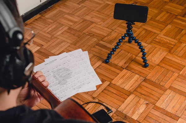 Rear View Caucasian Man Headphones Sitting Floor Studying Guitar Watching — Stock Photo, Image