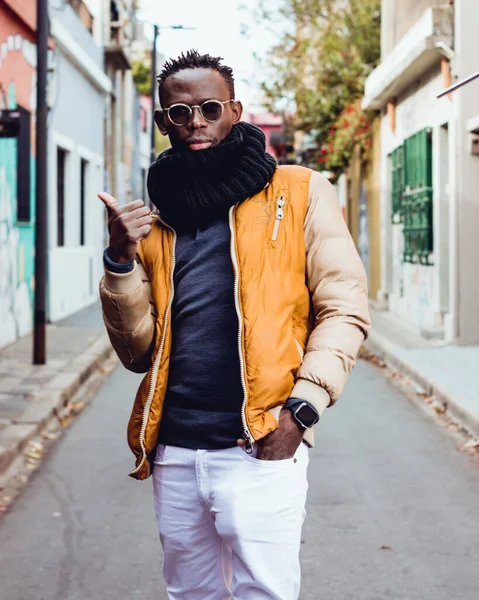 Young African Man Black Scarf Glasses Yellow Jacket Standing Street — Stok fotoğraf