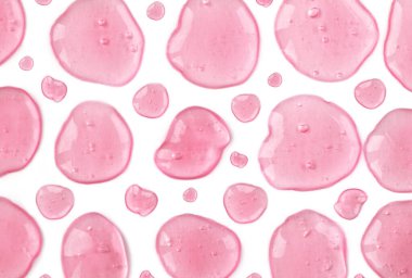 Pembe boyalı jöle ya da serum beyaz arka plan izole edilmiş. Soyut arkaplan deseni