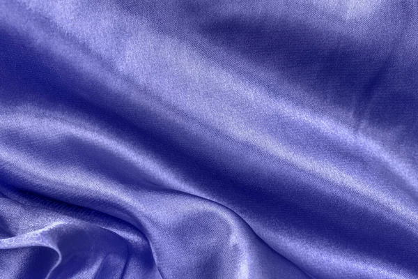 2022年の色滑らかなバイオレットブルーのシルクやサテンの折り目を閉じます。布の質感の背景。要旨壁紙 — ストック写真