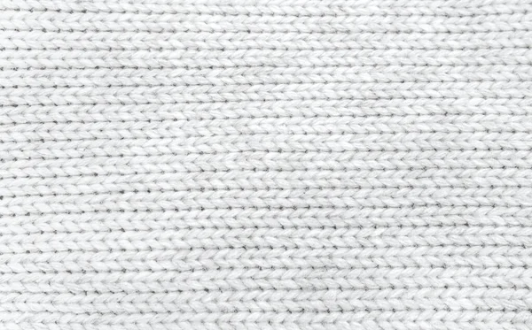 Soft knitted sweater texture closeup. Light abstract background — Stockfoto