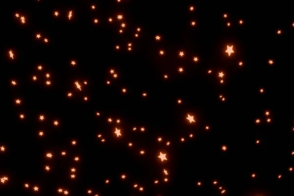 Трехмерный рендер из множества маленьких желтых оранжевых огней и звезд — стоковое фото