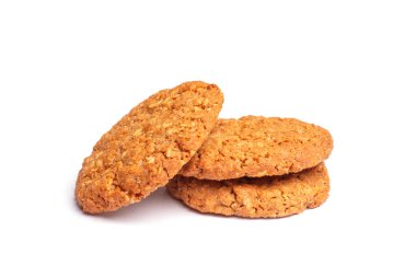 Beyaz arka planda yulaf ezmeli, vanilyalı kurabiyeler. Yakın çekim görünümü