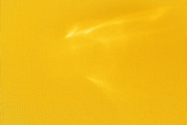 Beautiful effect of sun refraction on yellow background. Caustics texture — Stock Photo, Image