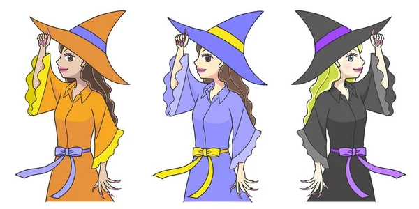 Cadı kostümlü üç genç kadın şapkalarıyla poz veriyor.