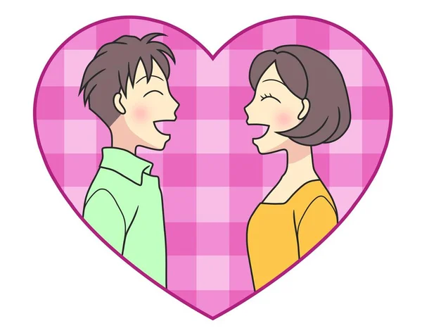 A young couple smiling in a pink plaid heart