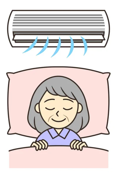 senior woman sleeping with air conditioner on
