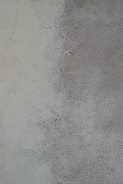 Solmuş iki tonluk beton arkaplanı kapat