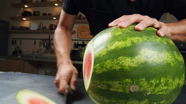 Close Male Hands Put Fresh Ripe Striped Green Watermelon Wooden — 图库照片