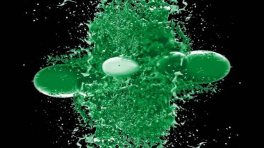 Kireç renkli bir mürekkep damlası tarafından oluşturulan soyut sıçrama arkaplanı, siyah arkaplana vurgulanır