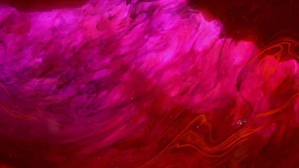 배경에 잉크가 폭발적으로 폭발합니다 추상적 분홍색 분홍색 잉크의 매혹적 움직임 — 스톡 사진